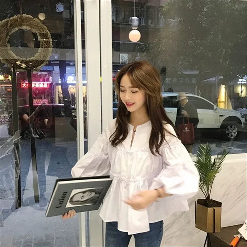 Babydoll-Bluse mit Ballonärmeln und einfarbigem V-Ausschnitt