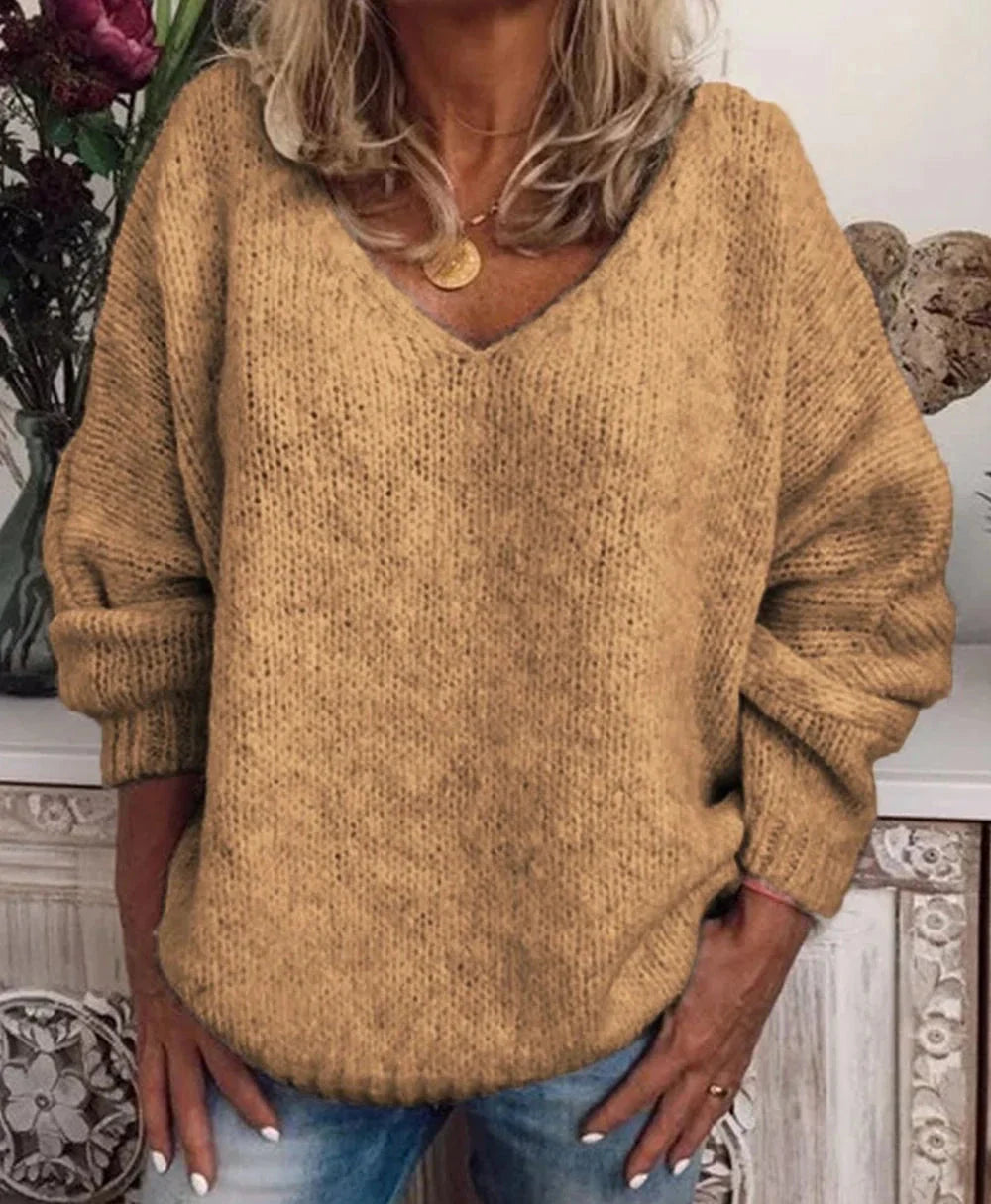 Langärmeliger lakonischer Pullover