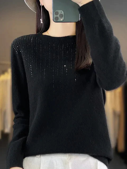 Warme glitzernde Strickjacke