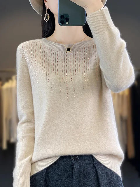 Warme glitzernde Strickjacke